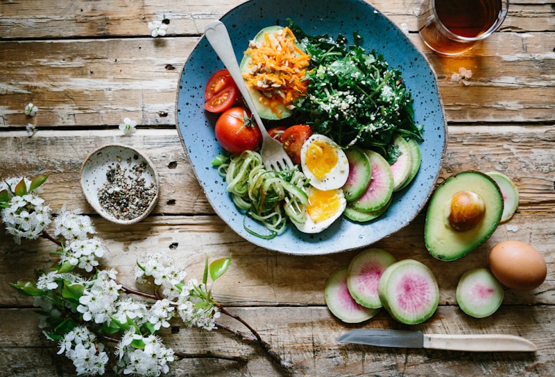 Consultant reviewing meal prep notes in a bright kitchen